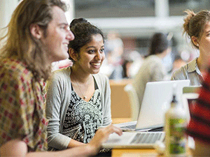 Students studying in the hub on campus