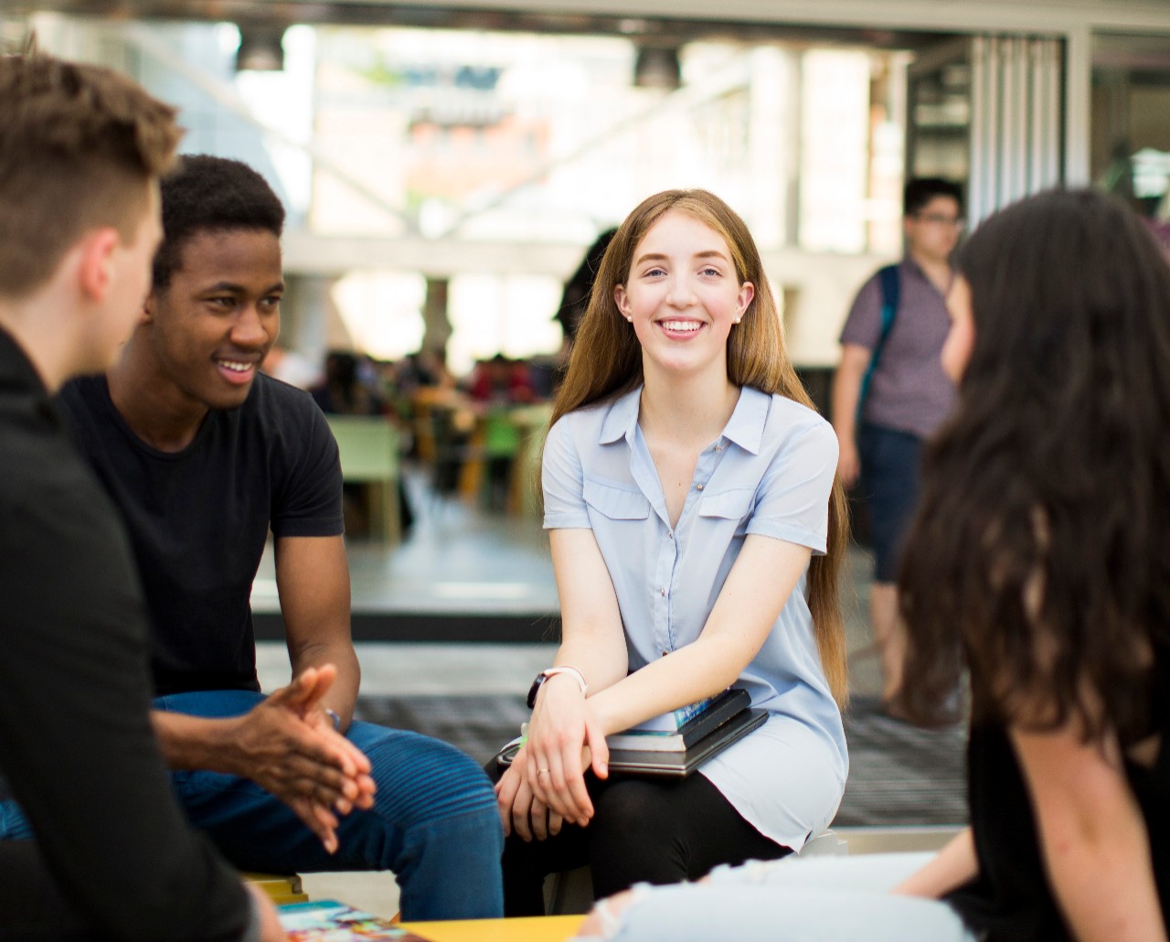 Group of student sitting in the Hub